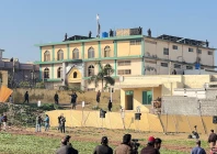 security forces personnel stand guard as members of the media film from a coordoned area following a deadly explosion at a shia muslim mosque in islamabad pakistan february 7 2026 photo reuters