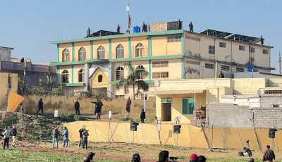 security forces personnel stand guard as members of the media film from a coordoned area following a deadly explosion at a shia muslim mosque in islamabad pakistan february 7 2026 photo reuters