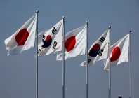 a view of south korean and japanese national flags hoisted ahead of the arrival of south korea s president yoon suk yeol and his wife kim keon hee at tokyo international airport photo reuters
