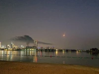 smoke rises over a hotel damaged in dubai s famed palm jumeirah in dubai photo reuters
