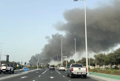 smoke billows from zayed port after an iranian attack following united states and israel strikes on iran in abu dhabi united arab emirates march 1 2026 picture taken with phone photo reuters