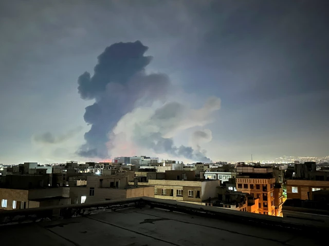 Iran will never surrender to US or Israel, Pezeshkian says as Israeli strikes intensify