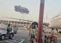 plume of smoke rises around dubai creek area as seen from dubai international airport in dubai united arab emirates march 7 2026 photo reuters