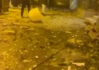 debris lies on the street following reported iranian drone strikes amid the u s  israeli conflict with iran in sitra bahrain march 9 2026 in this screengrab taken from a social media video photo reuters