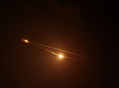 iran fires missile waves at israel as trump warns of more us strikes on kharg island iran fires missile waves at israel as trump warns of more us strikes on kharg island