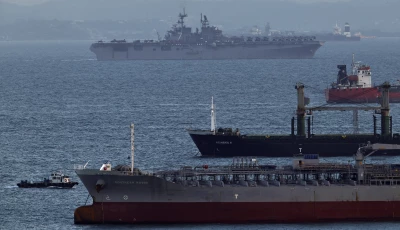 the uss tripoli lha 7 amphibious assault ship enters the singapore strait amid the u s israeli conflict with iran as seen from singapore march 17 2026 photo reuters the uss tripoli lha 7 amphibious assault ship enters the singapore strait amid the u s israeli conflict with iran as seen from singapore march 17 2026 photo reuters