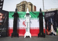 symbolic mock ups of iranian missiles are displayed on a street amid the u s  israeli conflict with iran in tehran iran march 22 2026 photo reuters