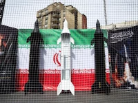 symbolic mock ups of iranian missiles are displayed on a street amid the u s  israeli conflict with iran in tehran iran march 22 2026 photo reuters