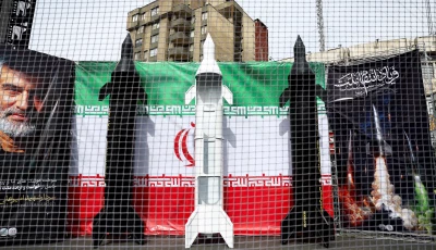 symbolic mock ups of iranian missiles are displayed on a street amid the u s  israeli conflict with iran in tehran iran march 22 2026 photo reuters