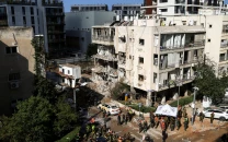 iran fires fresh missile waves at israel rejects trump s negotiation claims as fake news