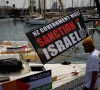 a banner with a message calling for the new zealand government to sanction israel hangs on a boat of a humanitarian flotilla preparing to depart for gaza in barcelona spain april 11 2026 photo reuters