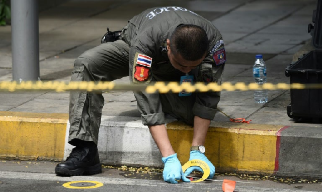 a policeman at the scene of the explosion photo afp a policeman at the scene of the explosion photo afp
