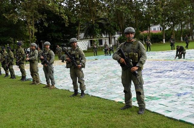 colombian police and soldiers guard more than 12 tons of seized cocaine in apartado colombia november 8 2017 photo reuters colombian police and soldiers guard more than 12 tons of seized cocaine in apartado colombia november 8 2017 photo reuters