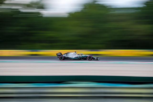 overtaking hamilton on saturday responded to a record breaking lap from verstappen of red bull with an outright record lap of his own at the hot dusty and technical hungaroring photo afp overtaking hamilton on saturday responded to a record breaking lap from verstappen of red bull with an outright record lap of his own at the hot dusty and technical hungaroring photo afp