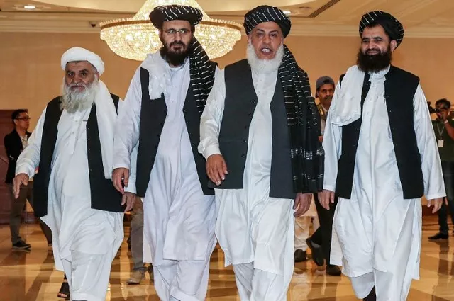 taliban members enter talks with afghan representatives in qatar photo afp file taliban members enter talks with afghan representatives in qatar photo afp file