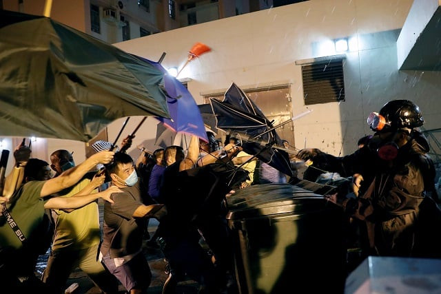 anti extradition bill protesters clash with off duty police during a march at wong tai sin a residential area in hong kong china photo reuters anti extradition bill protesters clash with off duty police during a march at wong tai sin a residential area in hong kong china photo reuters