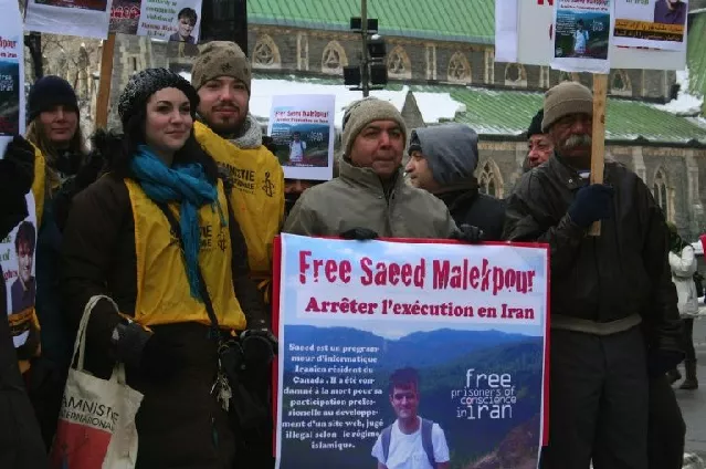 this photo shows supporters demonstrating for the release of saeed malekpour in montreal canada photo afp this photo shows supporters demonstrating for the release of saeed malekpour in montreal canada photo afp