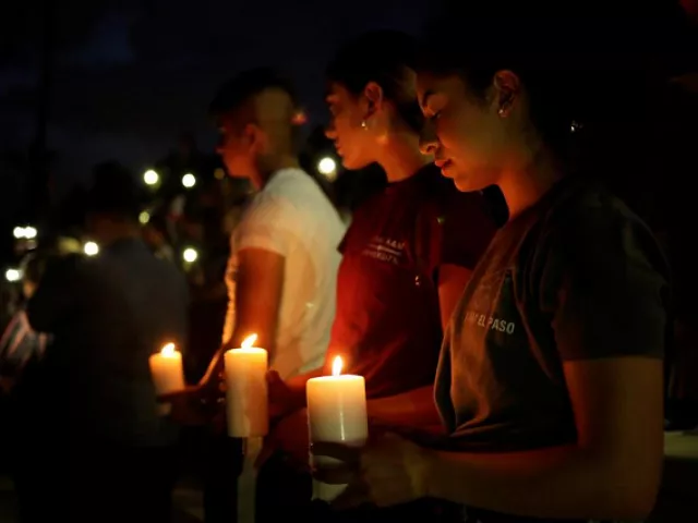 mourners taking part in a vigil at el paso high school after a mass shooting at a walmart store in el paso texas us august 3 2019 photo reuters mourners taking part in a vigil at el paso high school after a mass shooting at a walmart store in el paso texas us august 3 2019 photo reuters