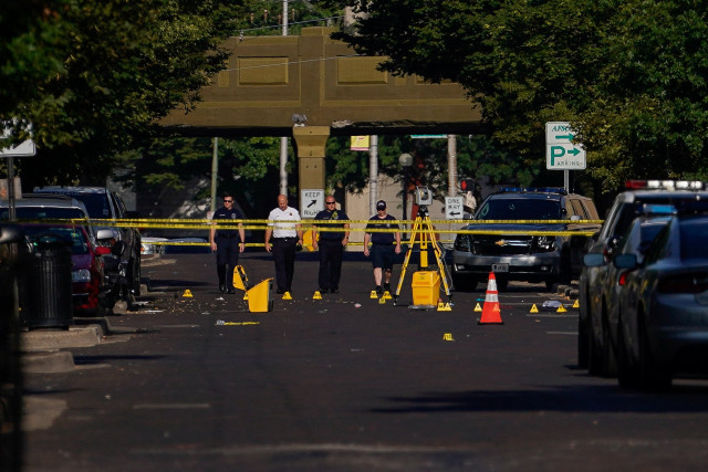 officials investigate the scene after a mass shooting in dayton photo reuters officials investigate the scene after a mass shooting in dayton photo reuters