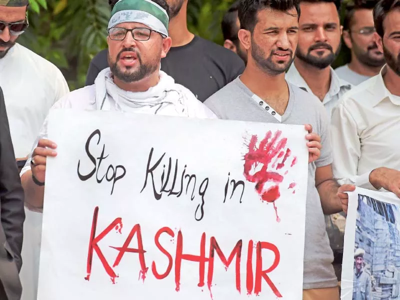 people hold a protest at the diplomatic enclave in islamabad photo afp people hold a protest at the diplomatic enclave in islamabad photo afp