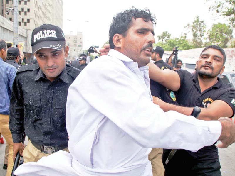 police detain a protester for attempting to enter the red zone as the teachers protest entered its 30th day on monday photo ppi