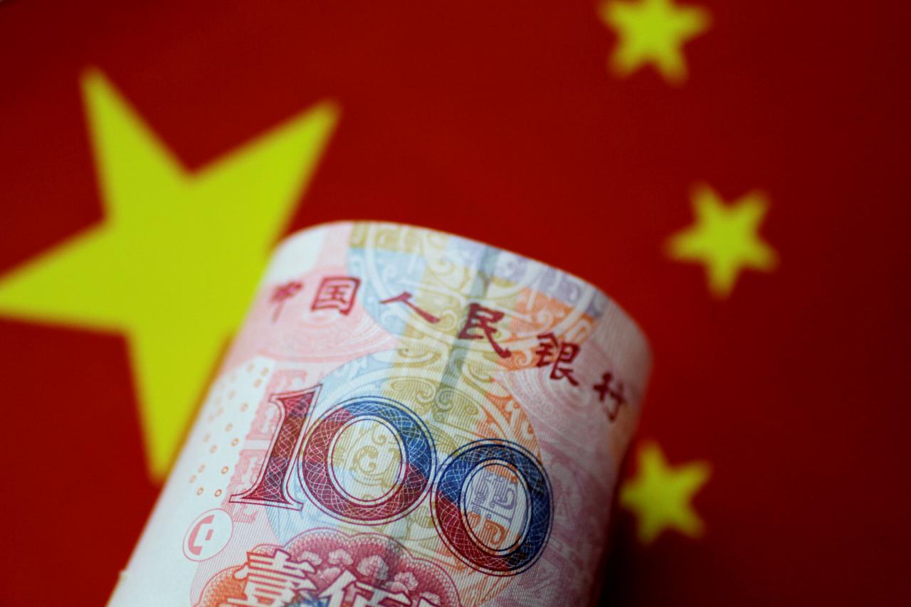 central bank fixes yuan 039 s central parity rate at 6 9996 per us dollar photo reuters