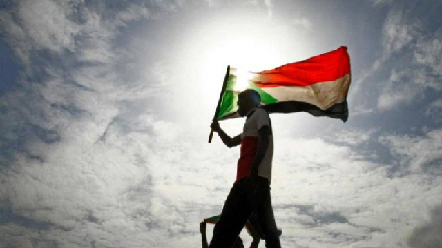 a sudanese man taking part in a demonstration photo afp a sudanese man taking part in a demonstration photo afp