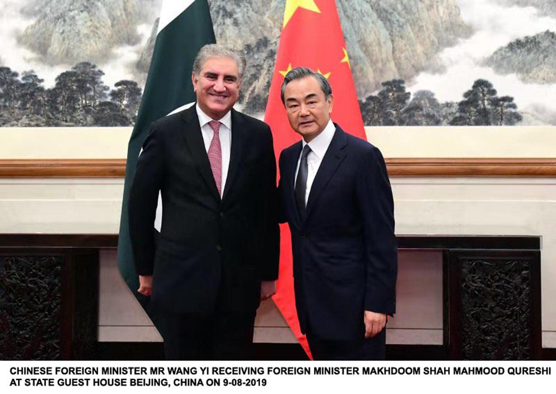 foreign minister shah mehmood qureshi with chinese counterpart wangu yi in beijing on friday photo pid