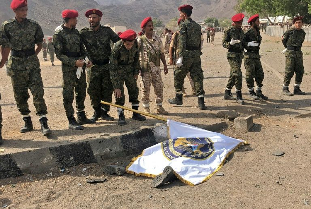 a parade was under way at the military camp west of yemen 039 s government held second city aden when it came under rebel missile and drone attack leaving at least 17 officers dead and scores wounded photo afp