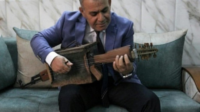 iraqi teacher transforms kalashnikov into musical instrument iraqi teacher transforms kalashnikov into musical instrument