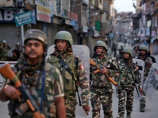 indian security forces personnel patrol a deserted street during restrictions in srinagar august 9 2019 photo reuters indian security forces personnel patrol a deserted street during restrictions in srinagar august 9 2019 photo reuters