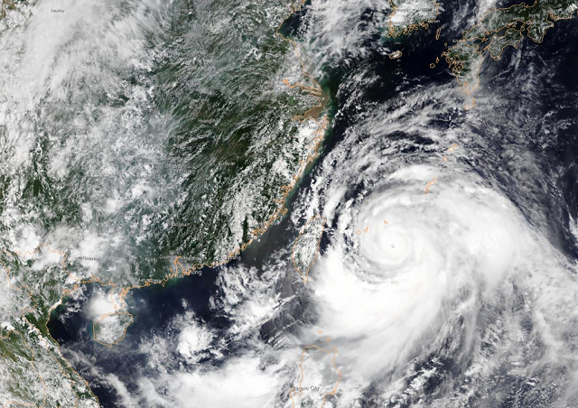 satellite image obtained courtesy of the national oceanic and atmospheric administration noaa shows typhoon lekima approaching southeastern china photo afp