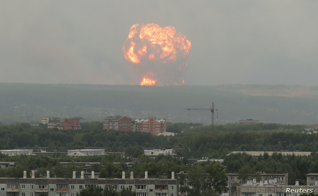 flame and smoke rise from the site of blasts at an ammunition depot near the town of achinsk in krasnoyarsk region russia photo reuters