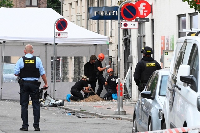 danish police technicians work inspect the scene on hermodsgade outside a local police station in copenhagen on saturday after the police station was hit by an explosion in the early morning photo afp