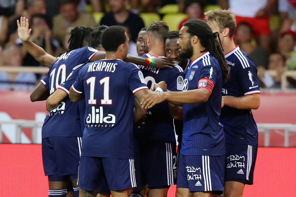 stars of the day moussa dembele and memphis depay scored either side of fabregas 039 dismissal in the first half while lucas tousart added a third with 10 minutes remaining photo afp