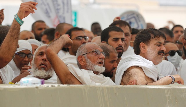 hajj pilgrims cast their stones at a pillar symbolising the stoning of satan during the annual haj pilgrimage in mina photo reuters