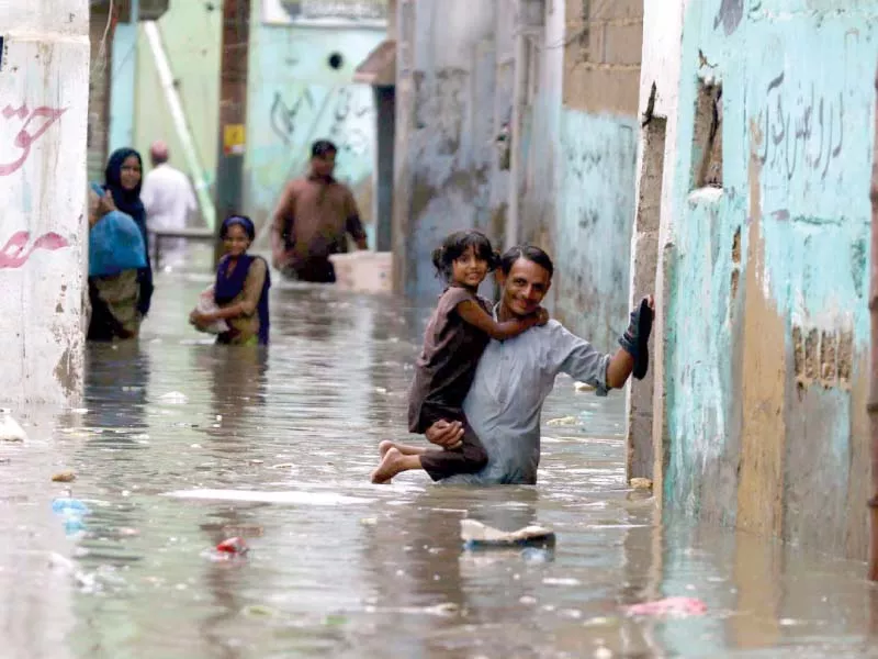 life in almost all towns and cities in the coastal belt of sindh was paralysed after the second spell of monsoon rain local bodies aided by police rescue workers and pakistan army personnel attempted to provide relief photos app ppi life in almost all towns and cities in the coastal belt of sindh was paralysed after the second spell of monsoon rain local bodies aided by police rescue workers and pakistan army personnel attempted to provide relief photos app ppi