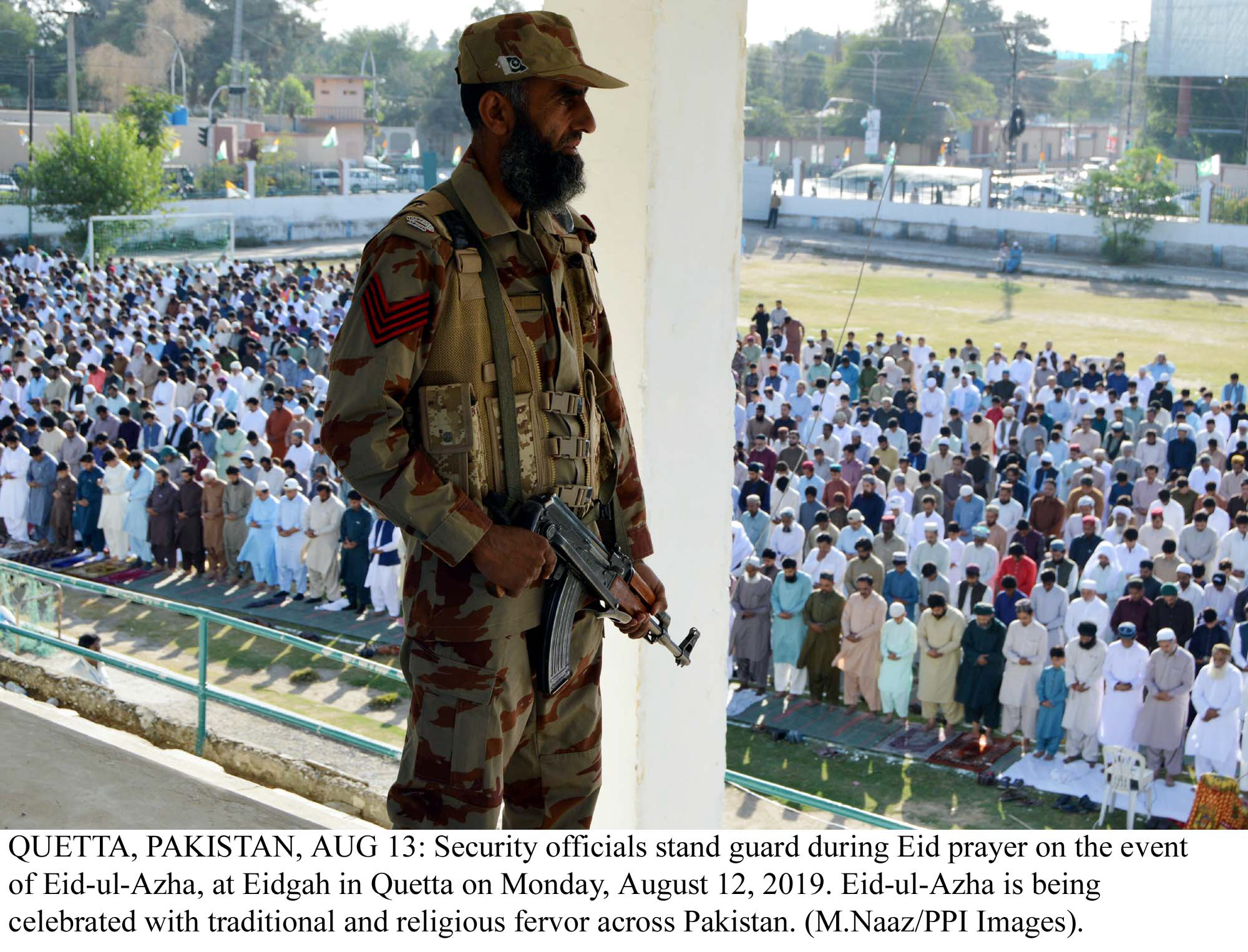 a security official stands guard during an eid congregation in quetta photo ppi