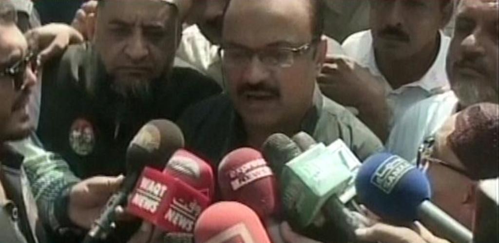 express news screengrab of malik aamir dogar speaking to reporters in multan