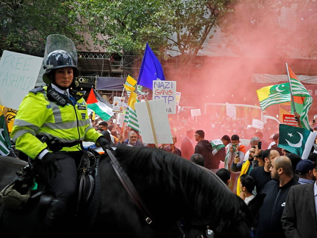 anti india demonstrators wave pakistan and azad kashmir flags as they protest outside of the indian high commision in central london on august 15 2019 photo afp anti india demonstrators wave pakistan and azad kashmir flags as they protest outside of the indian high commision in central london on august 15 2019 photo afp