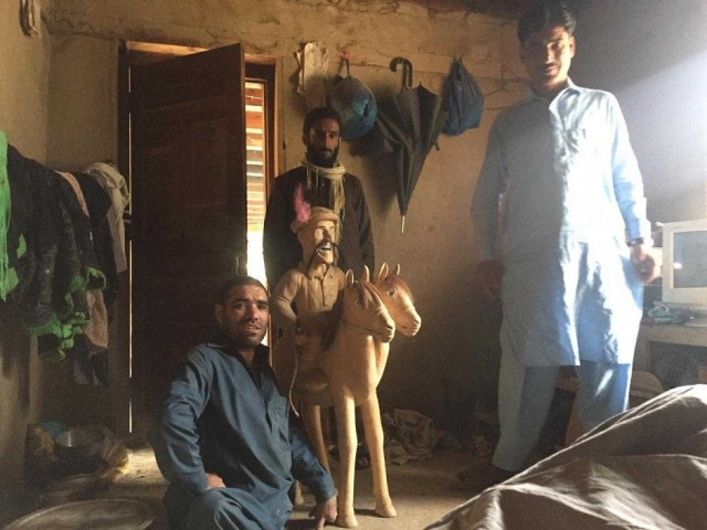 instead of letting his disabilities be a burden wali has put his artistic talents towards the welfare of his people photo express
