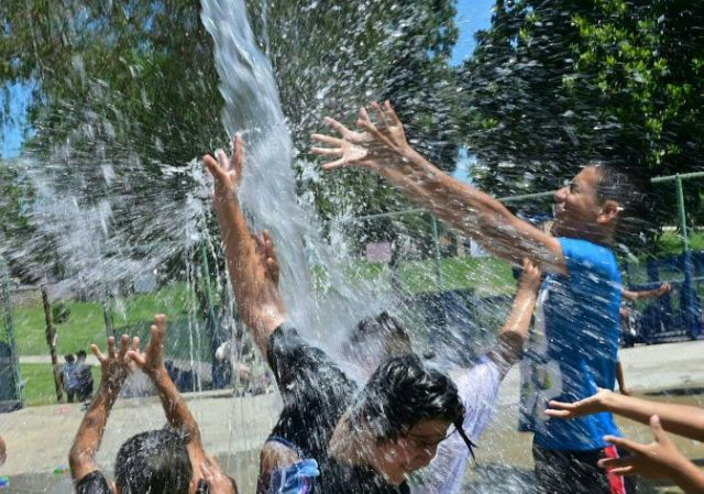 children cool off at a water park in alhambra photo afp