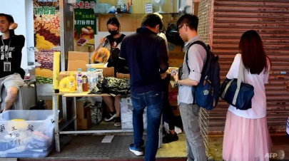 gas masks and hard hats at hong kong s protest pop up store