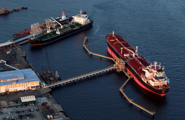 oil tankers qi lin zuo of china and sti matador stand attached to mooring stations near a refinery in bayonne photo reuters oil tankers qi lin zuo of china and sti matador stand attached to mooring stations near a refinery in bayonne photo reuters