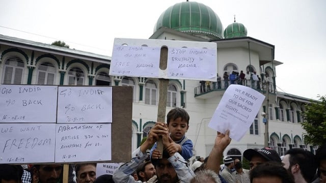 a young boy joins protesters holding playcards at a rally against the indian government 039 s move to strip occupied kashmir of its autonomy and impose a communications blackout in srinagar on august 16 2019 photo afp a young boy joins protesters holding playcards at a rally against the indian government 039 s move to strip occupied kashmir of its autonomy and impose a communications blackout in srinagar on august 16 2019 photo afp