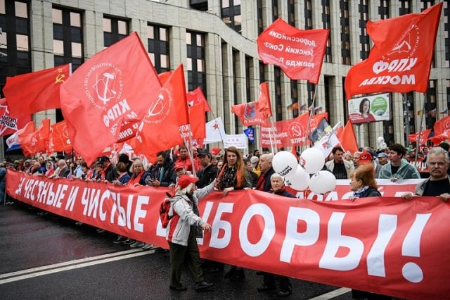 around 4 000 people took part in an approved communist party rally for free elections photo afp around 4 000 people took part in an approved communist party rally for free elections photo afp