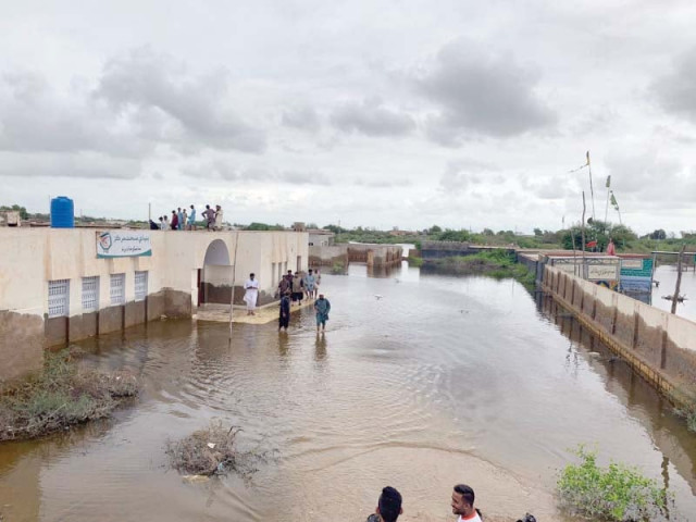 a basic health unit in mirpur sakro taluka remains submerged in water days after the recent spell of monsoon rains locals from the nearby village have started migrating photos courtesy saleem lakho