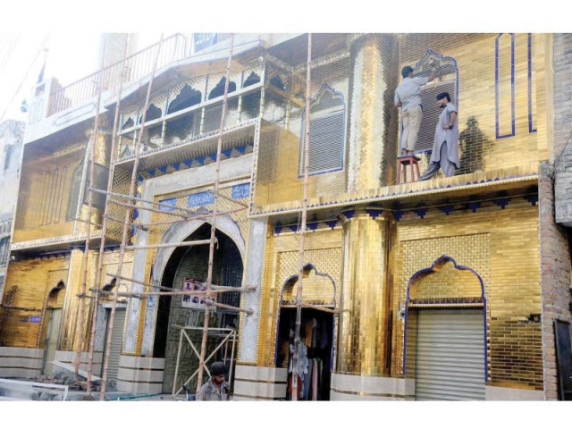 workers spruce up imambargah qademi in rawalpindi photo nni workers spruce up imambargah qademi in rawalpindi photo nni