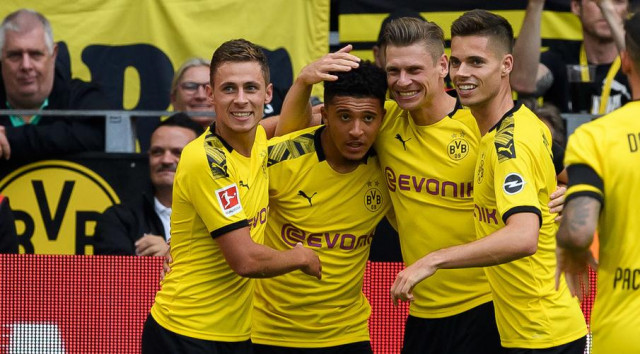england international jadon sancho who claimed his first goal of the term in dortmund 039 s supercup victory over bayern munich two weeks ago was among the scorers again as dortmund ran riot to go top of the table photo apf england international jadon sancho who claimed his first goal of the term in dortmund 039 s supercup victory over bayern munich two weeks ago was among the scorers again as dortmund ran riot to go top of the table photo apf