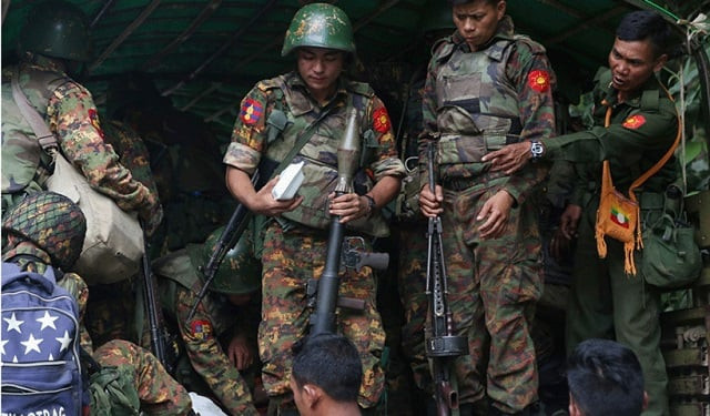 armed government troops arrive outside the gote twin police station in shan state on august 15 2019 after it was attacked by ethnic rebel groups photo afp armed government troops arrive outside the gote twin police station in shan state on august 15 2019 after it was attacked by ethnic rebel groups photo afp